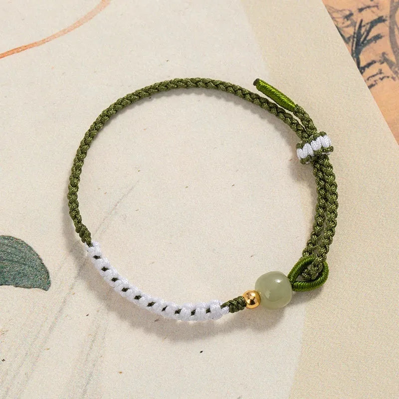 Hetian jade and sterling silver national tide bracelet with adjustable cord strap in spring green
