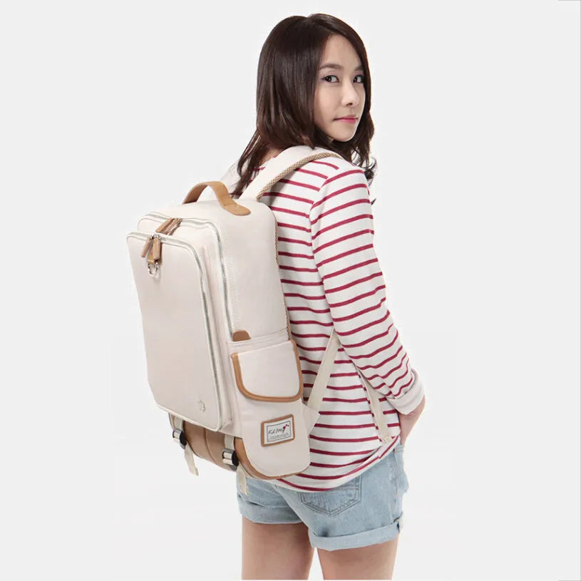 Modern men's Oxford cloth backpack in army green colour, showing large main compartment.