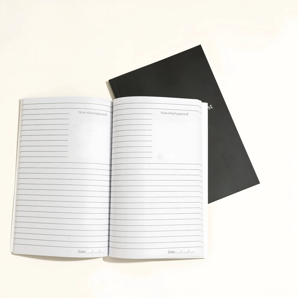 Black hardcover dream journal notebook with dot grid paper for dream recording