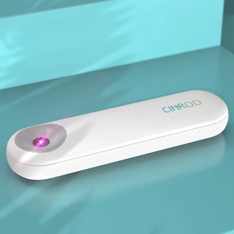 White portable UV-C sterilizer disinfection lamp showing compact handheld design