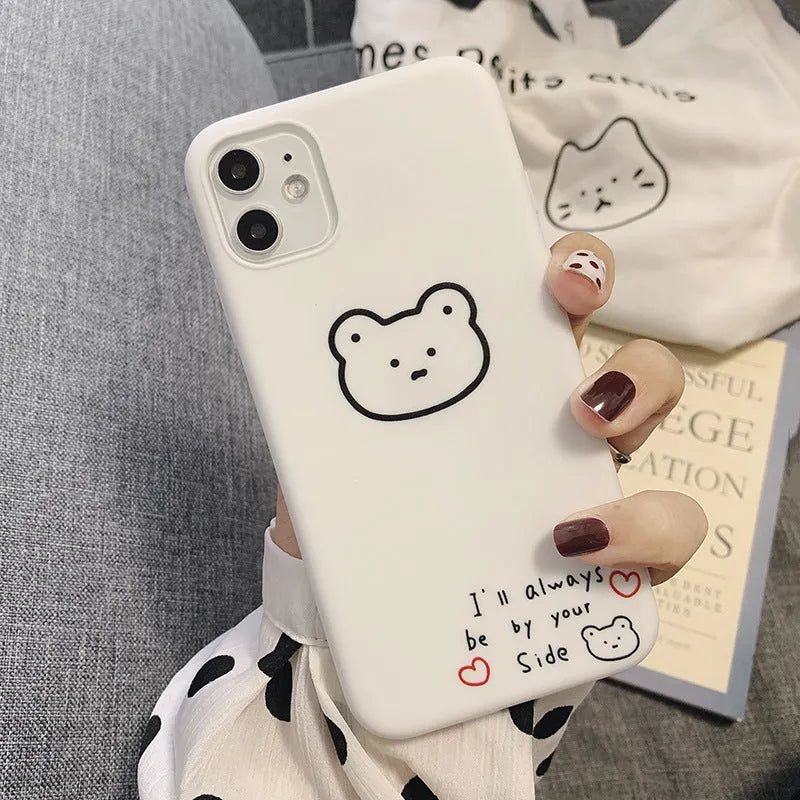 Soft silicone iPhone case with a Korean bear cartoon design on the back.