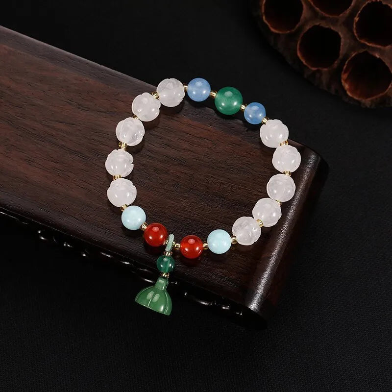 Carved bodhi root pumpkin lotus bracelet with white jade beads and mixed sizing