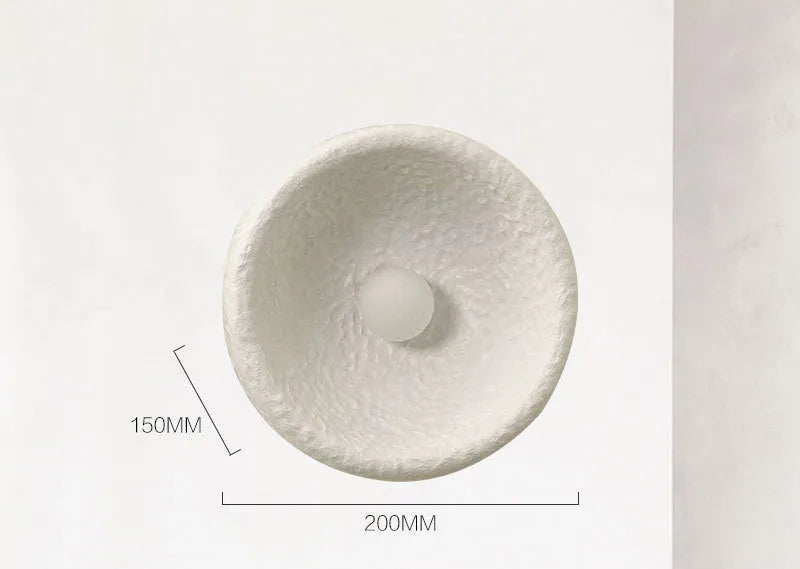 Japanese minimalist wall lamp with round resin shade in warm white light