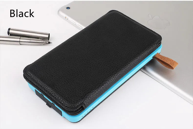 Outdoor solar power bank in black with solar panel, LED light, and soft leather exterior.