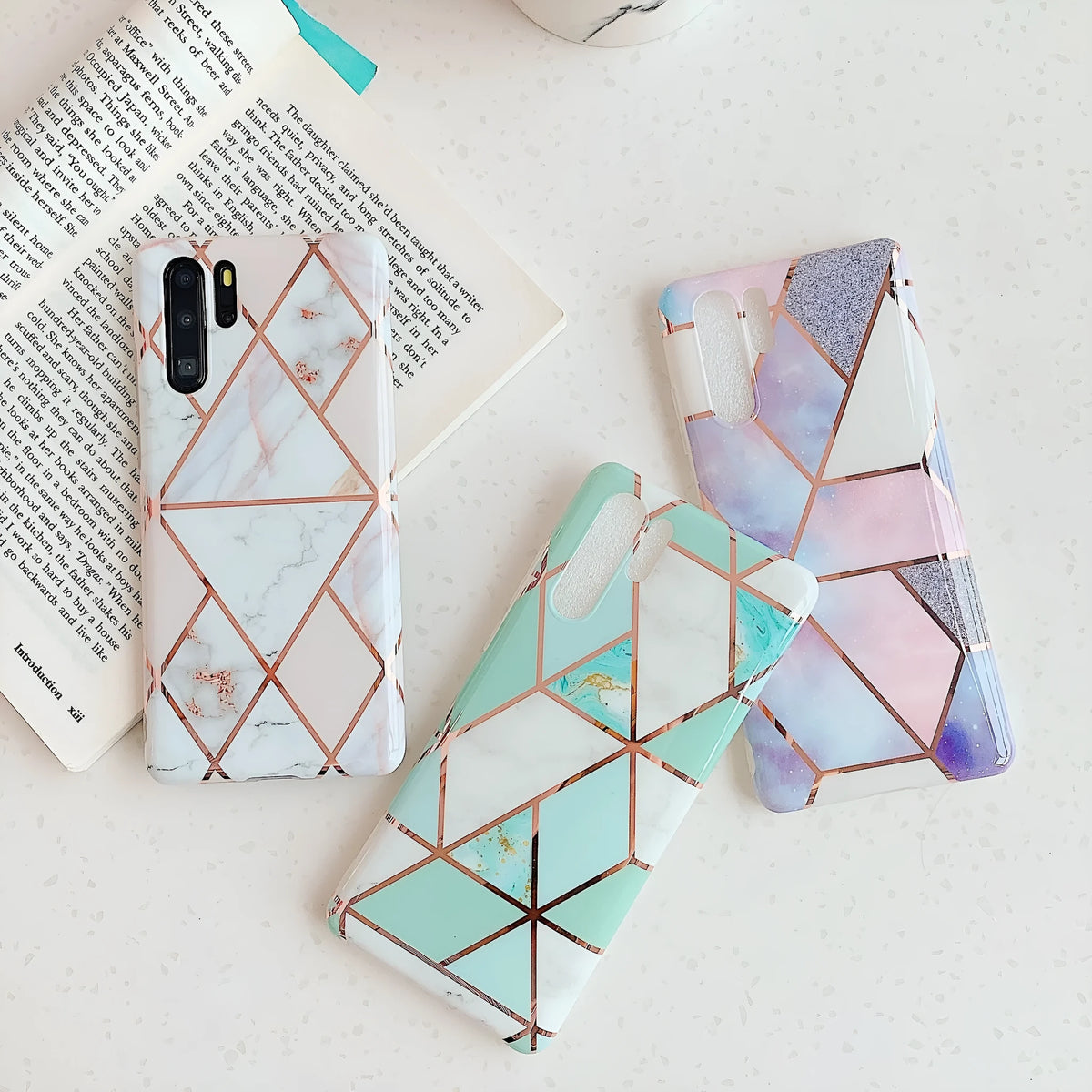 Electroplated marble patterned TPU back cover case for Huawei and Samsung smartphones.