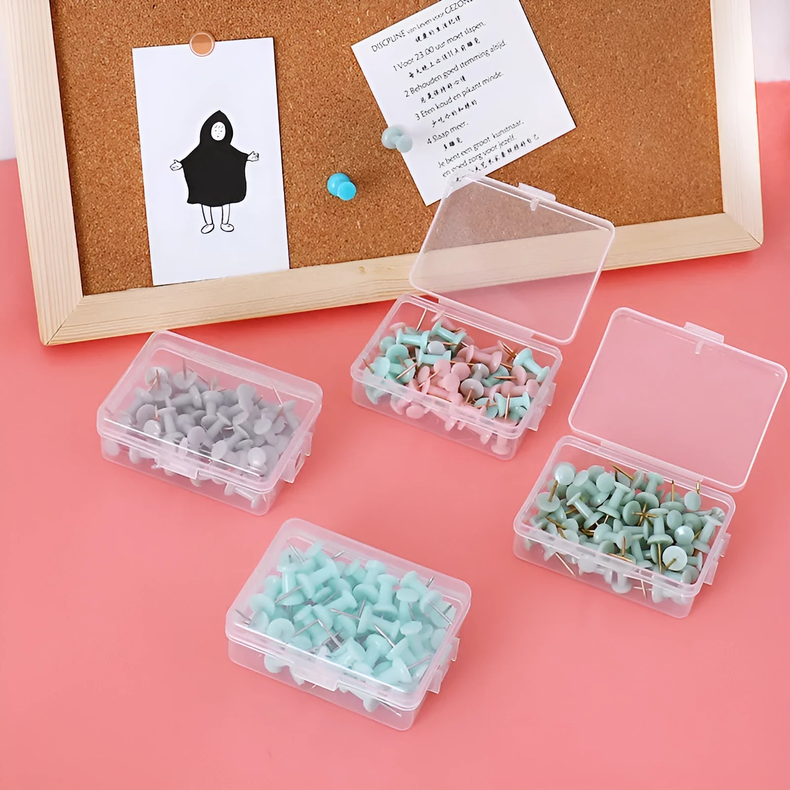 Assorted Morandi colour pushpins in green, grey, and pink with button, star, and push-button head styles