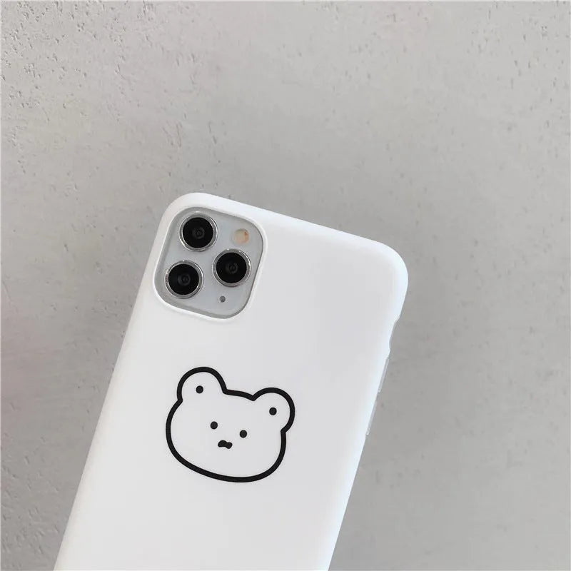 Soft silicone iPhone case with a Korean bear cartoon design on the back.