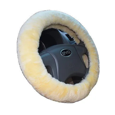 Wool and cashmere steering wheel cover and two handle covers in sapphire blue colour.