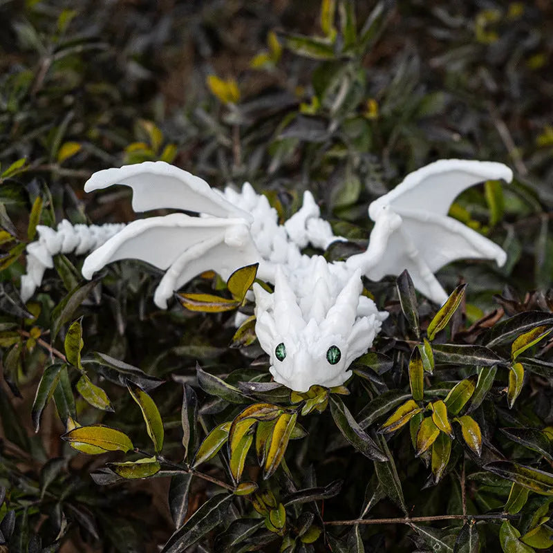 Red and gold printed dragon wings decorative toy made of PLA plastic.