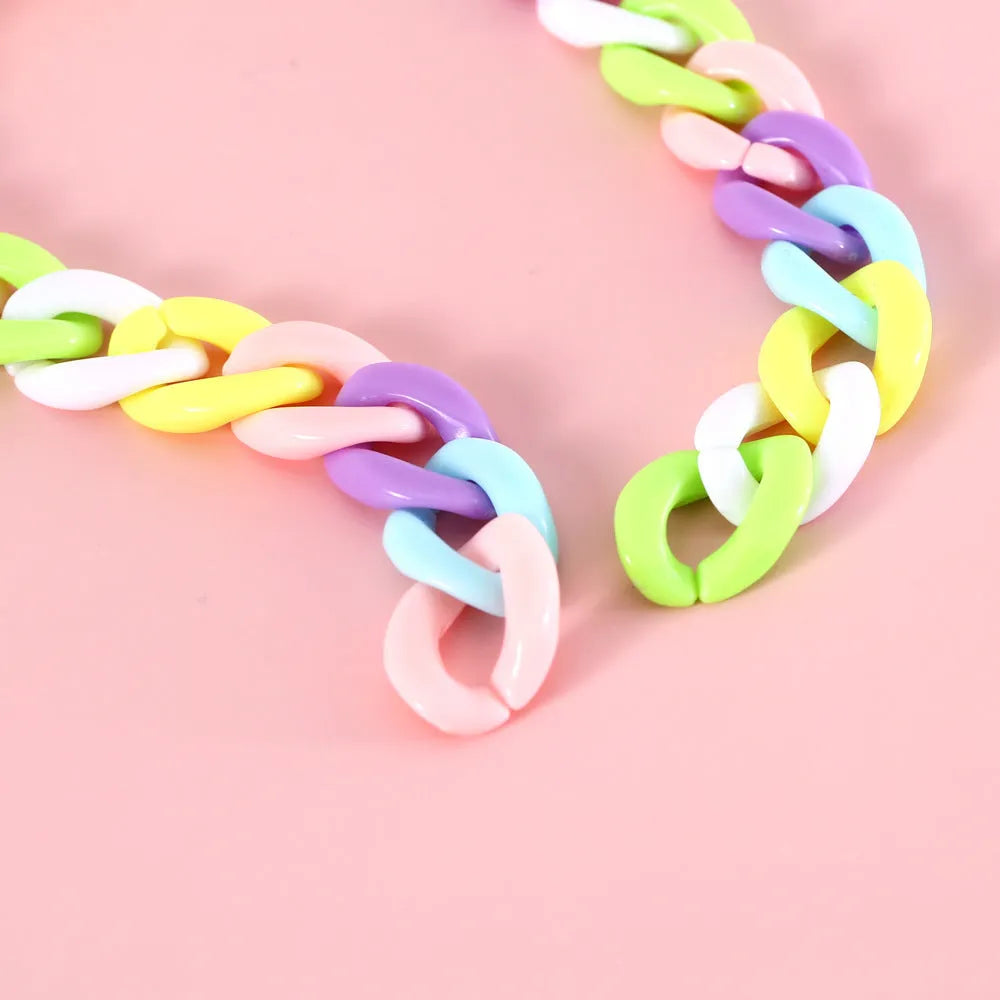 Plastic pet collar in macaron candy colours showing chain blue, pink, and mixed colour options for cats, dogs, and rabbits