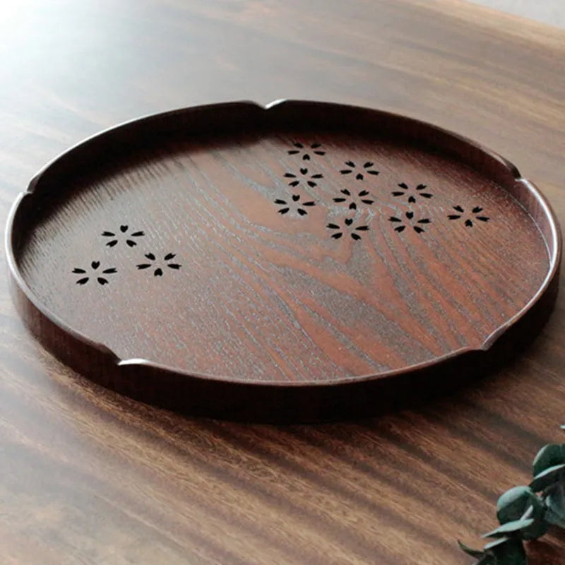 Wooden round shallow plate with hollow Sakura cherry blossom pattern, 30cm diameter.