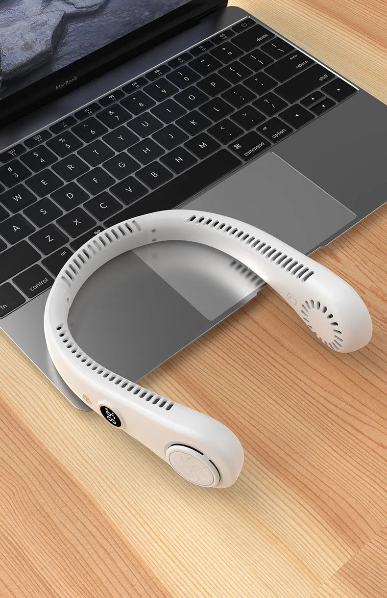 Pink portable bladeless neck fan being worn, showing flexible neckband and air outlets.