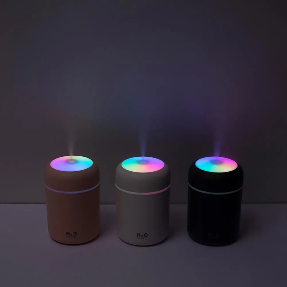 Pink USB desktop humidifier with mood lights and water tank