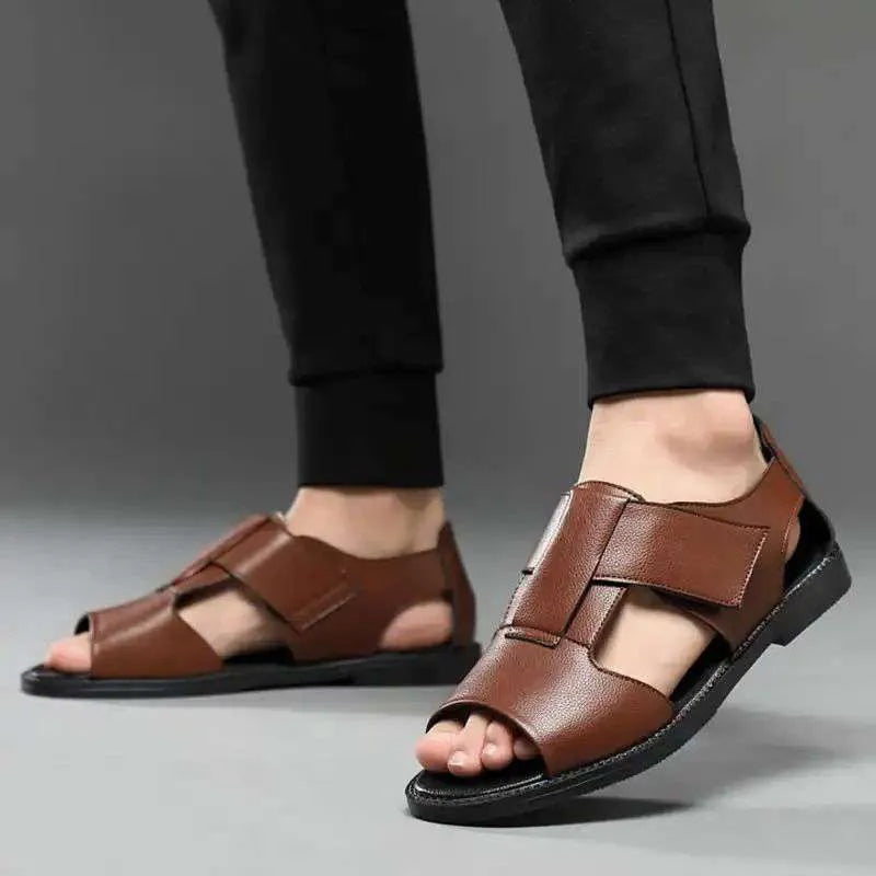 Men's black leather Roman sandals with open-toe design and rubber soles