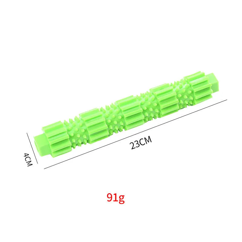 Green and orange bone-shaped rubber dog chew toy for aggressive chewers with treat hole and textured surface.