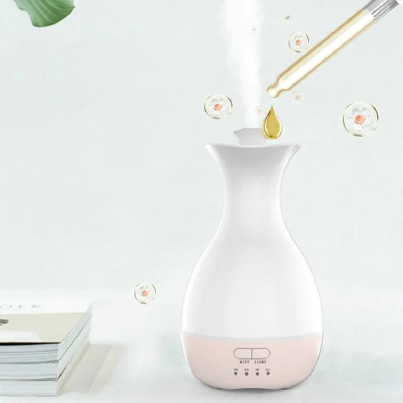 White or pink ultrasonic aromatherapy vase humidifier with colourful night light and essential oil diffuser