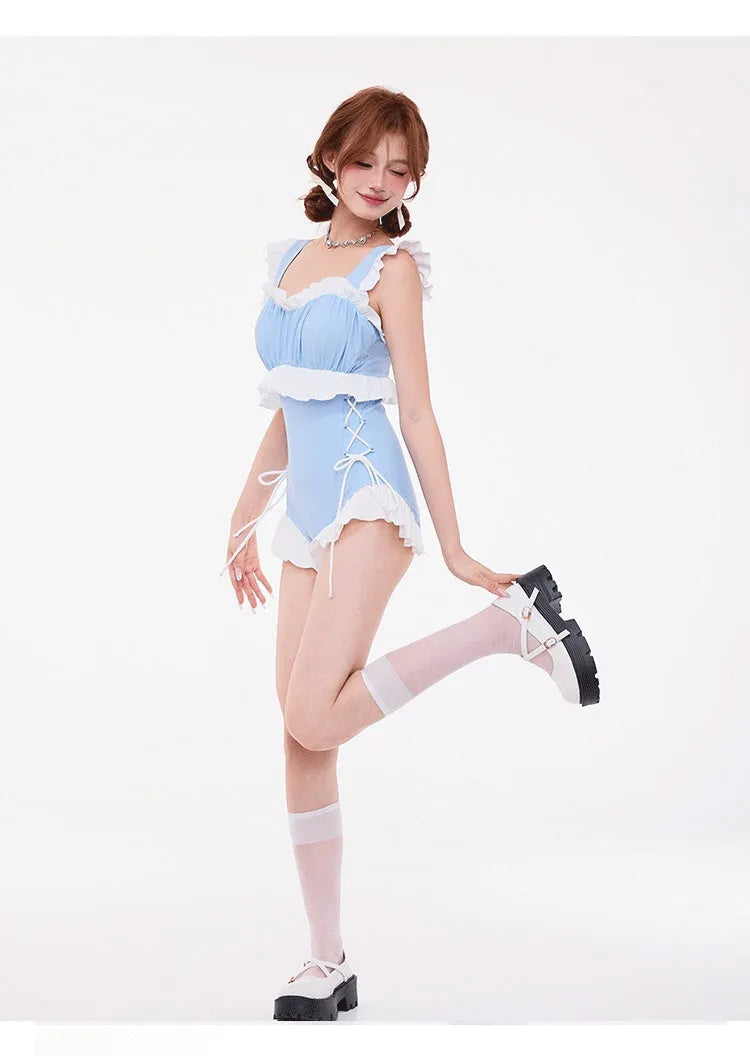 Light blue one-piece swimsuit with high waist and backless design in nylon fabric