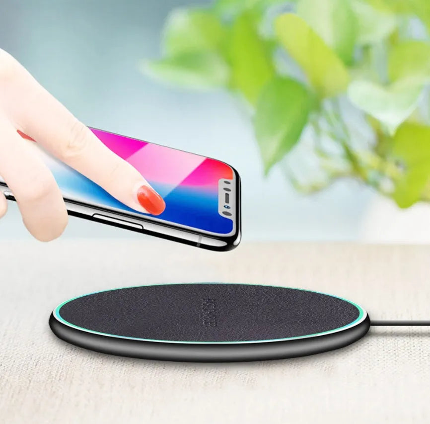 Black Quick Qi wireless charging pad with LED indicator for iPhone 11 and Qi phones