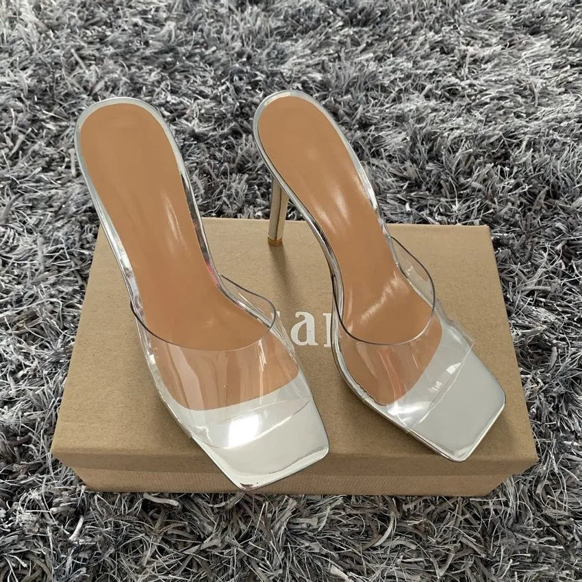 Women's black and silver high heel fashion boots with PVC soles