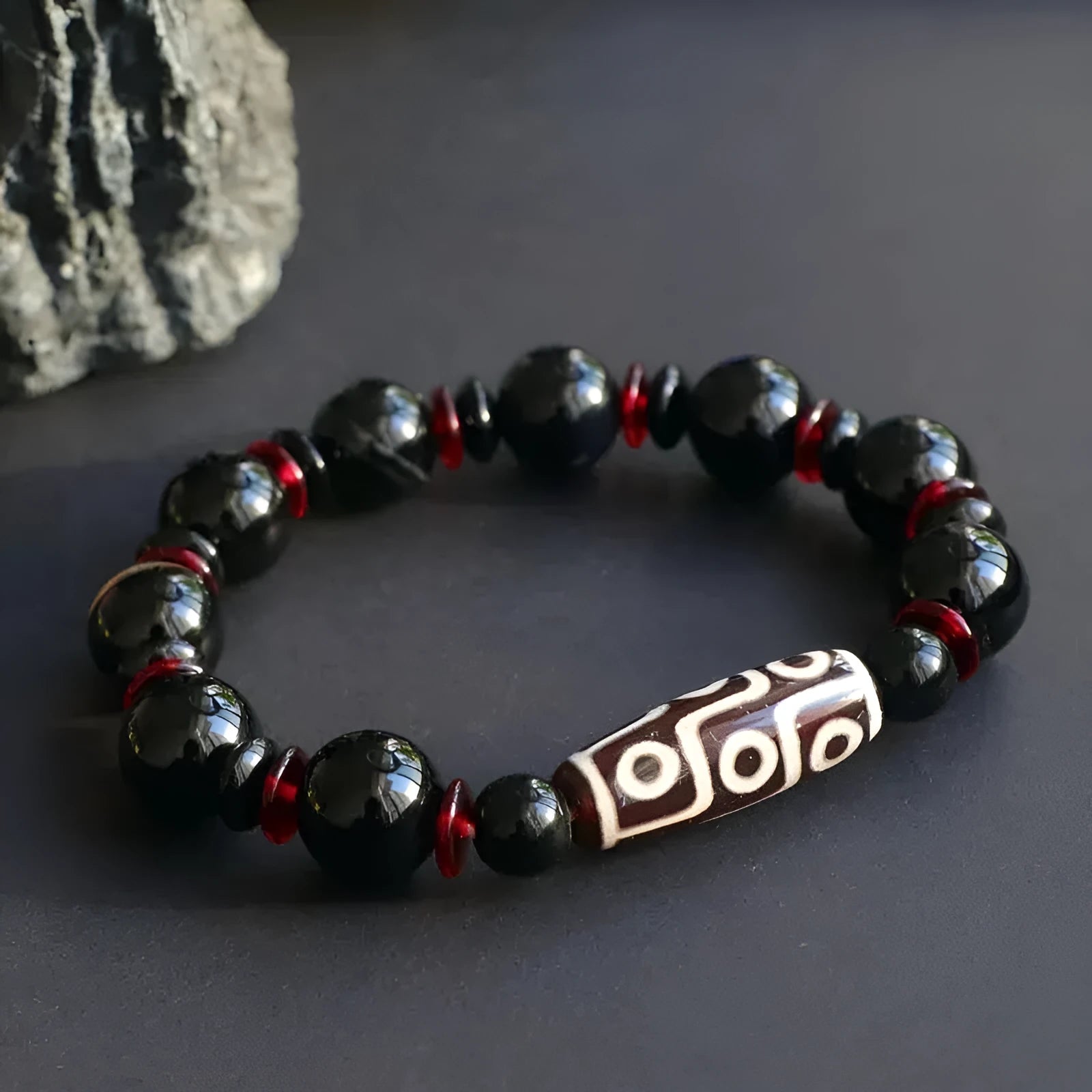 Hand-woven black agate Dzi bead bracelet with geometric design and national style elements