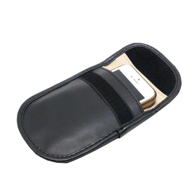 Black microfiber Faraday cage bag for blocking car key and RFID signals, size 13.5cm by 9.5cm.