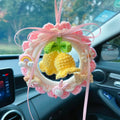 Handmade woven wool bell orchid car pendant hanger in green, shown with optional dream catcher