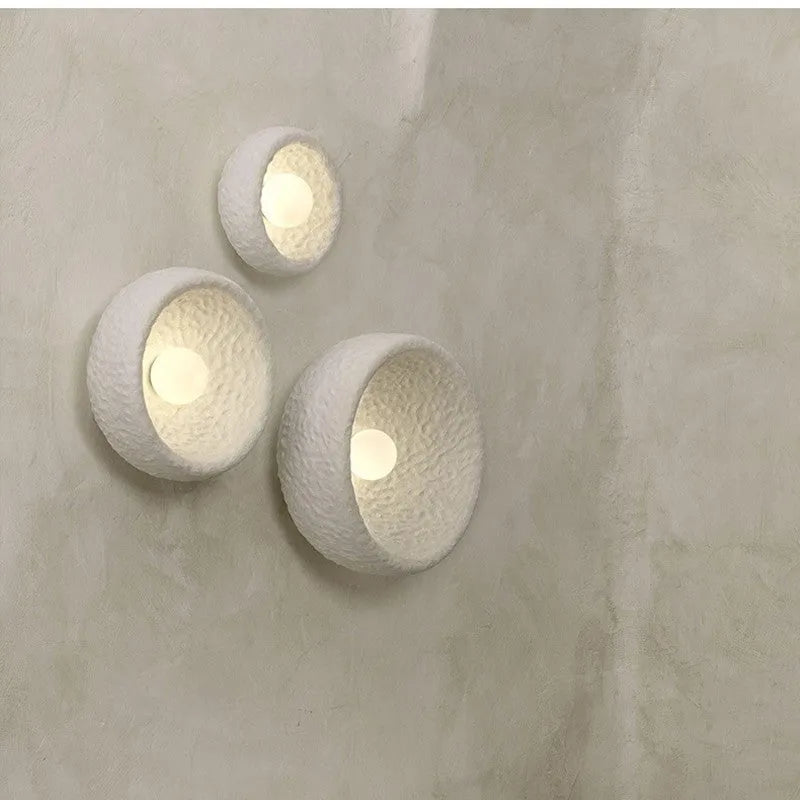 Japanese minimalist wall lamp with round resin shade in warm white light