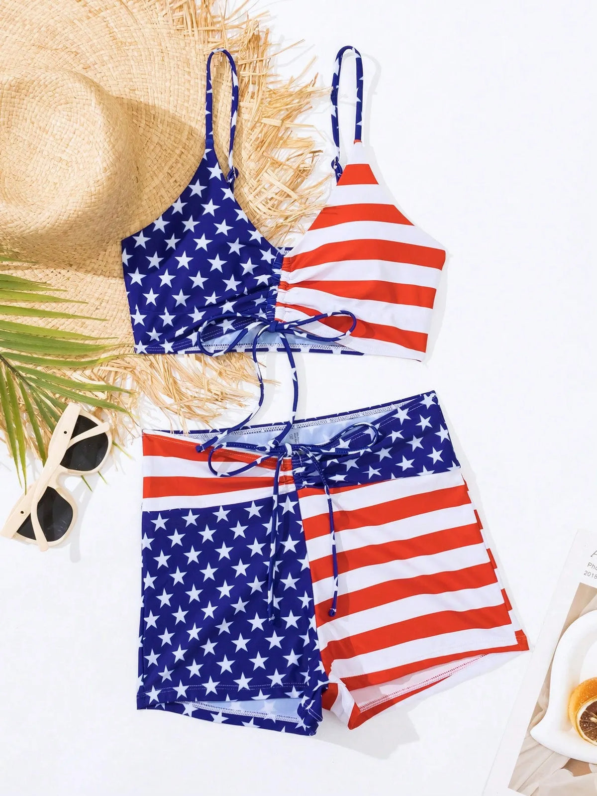 Women's high waist boxer style swimsuit with drawstring and red, white, and blue stars and stripes pattern.