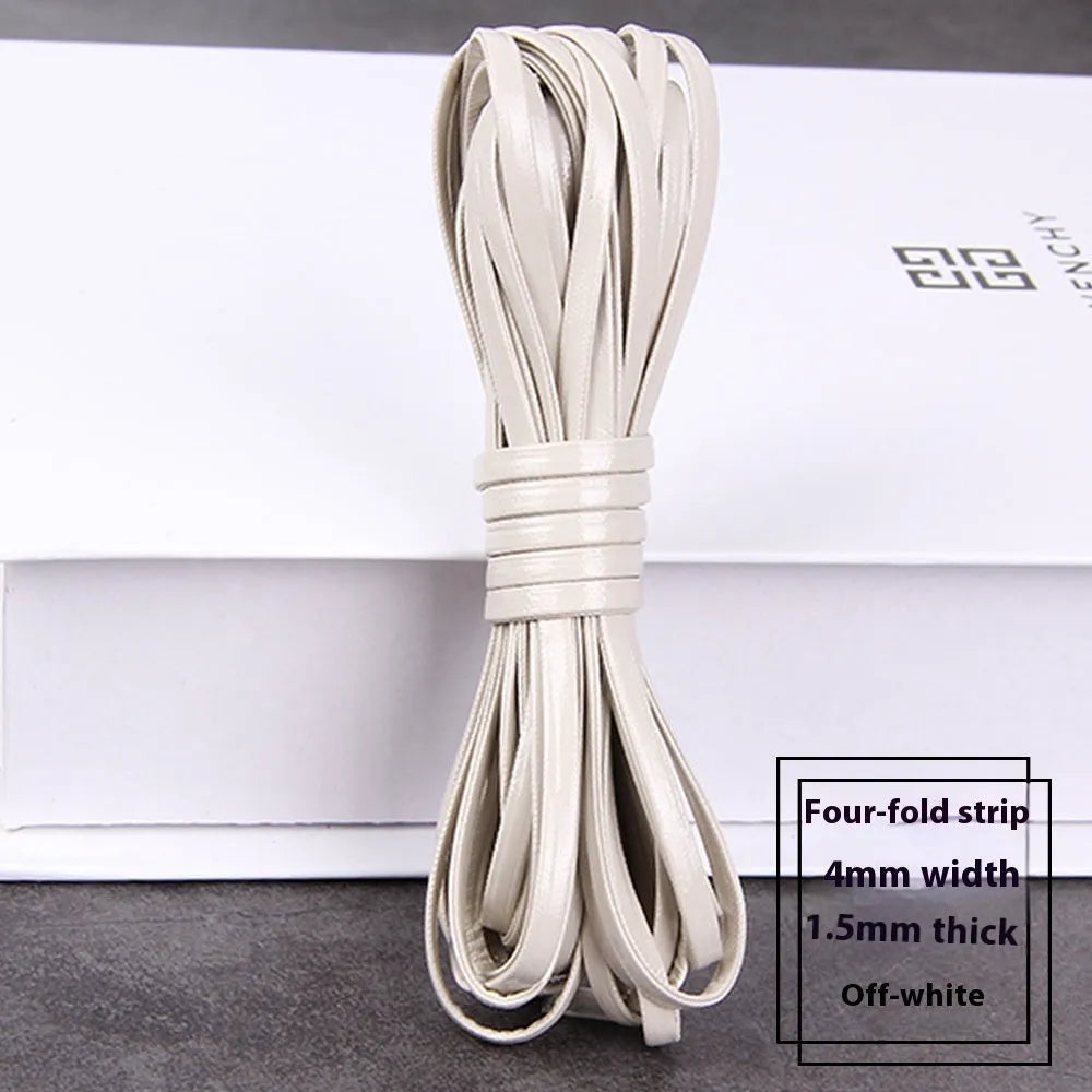 Coiled PU leather woven craft string in multiple colours including beige, black, red, blue, green, gold, and silver.