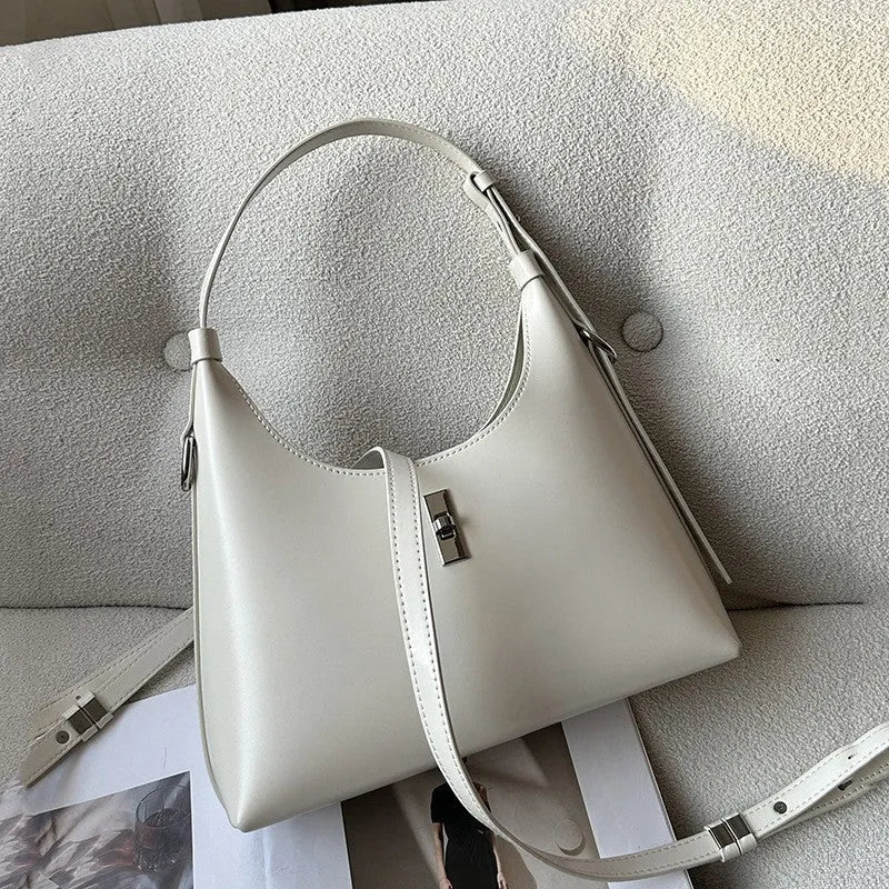 Genuine leather crossbody shoulder bag with sandwich pocket design in dumpling shape