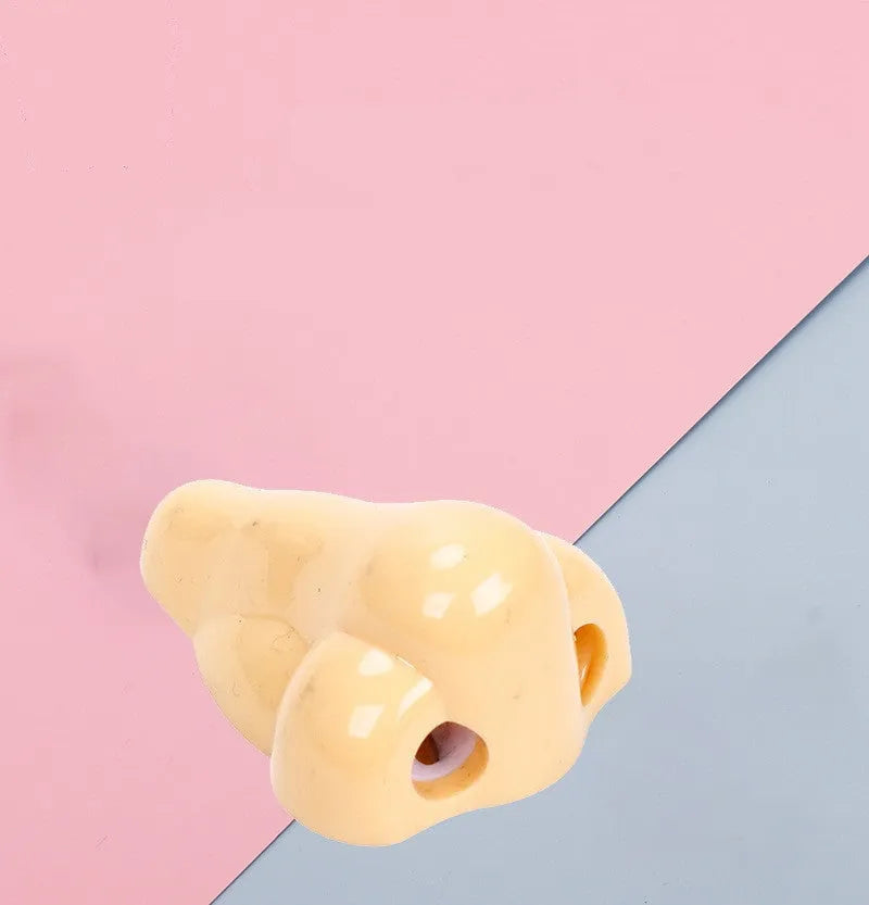 Geometry-shaped flesh colour plastic pencil sharpener with big nostril opening for standard pencils