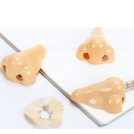 Geometry-shaped flesh colour plastic pencil sharpener with big nostril opening for standard pencils