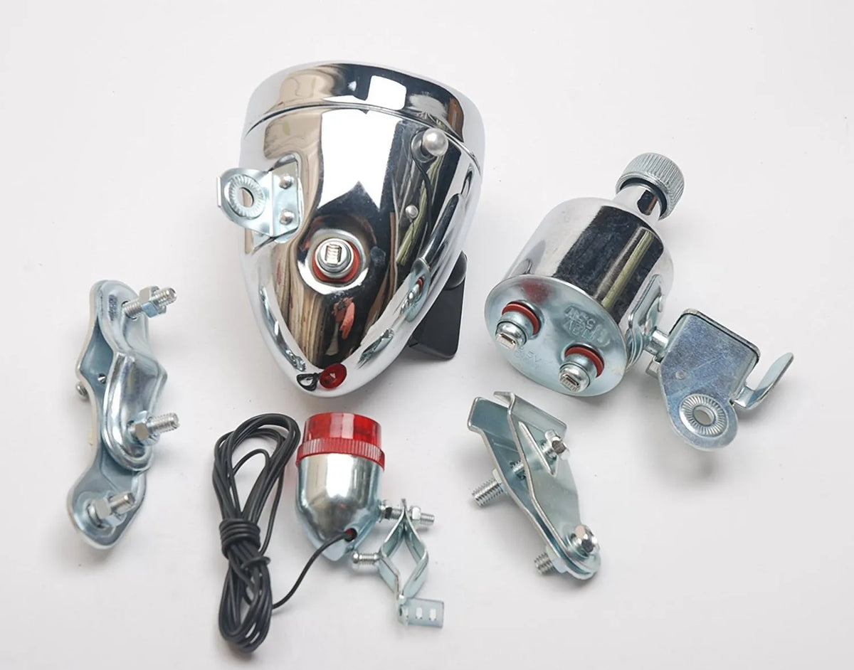 Silver bicycle dynamo light set with generator unit and wiring for front fork or rear frame mounting