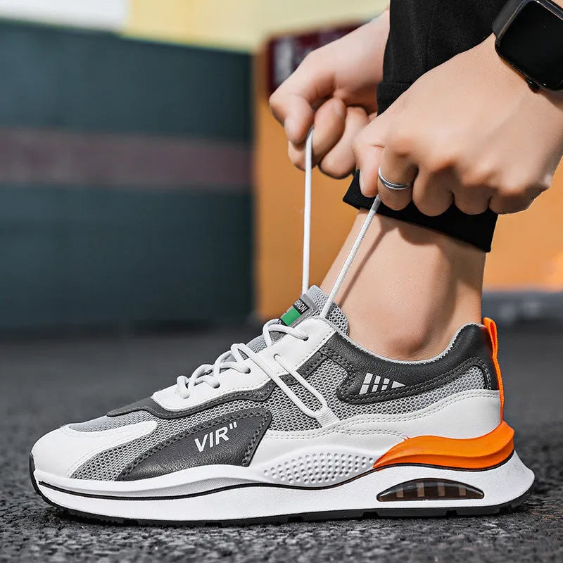 Men's grey and black breathable mesh casual running shoes with a round toe and lightweight EVA sole.