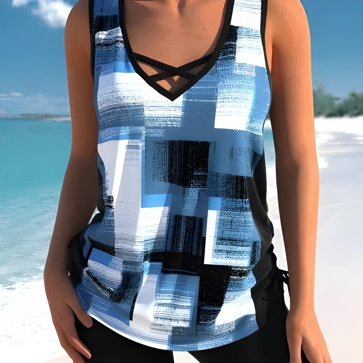 Women's two-piece swimsuit set with a top and printed boxer shorts in a solid colour.