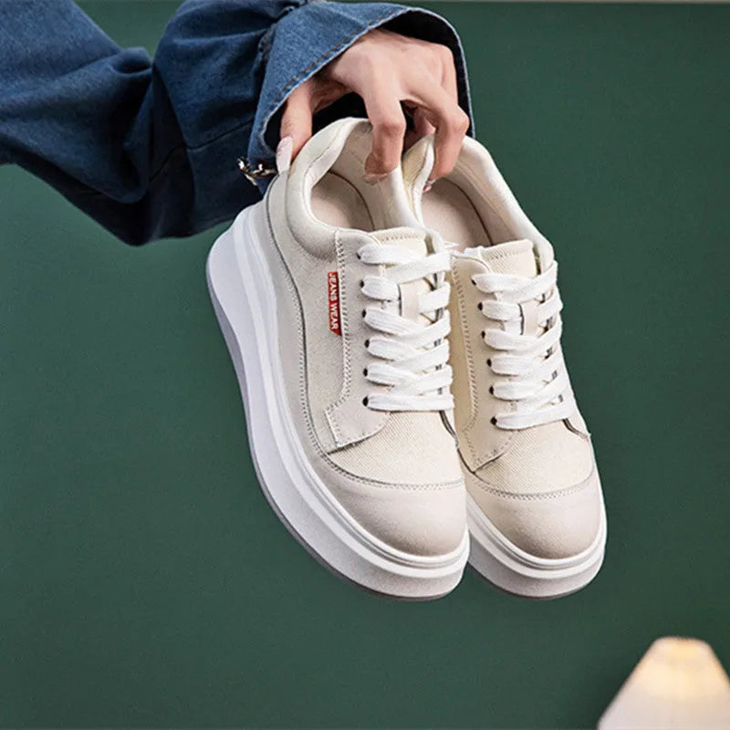Beige and pink women's cowhide leather platform board shoes with a thick sole.
