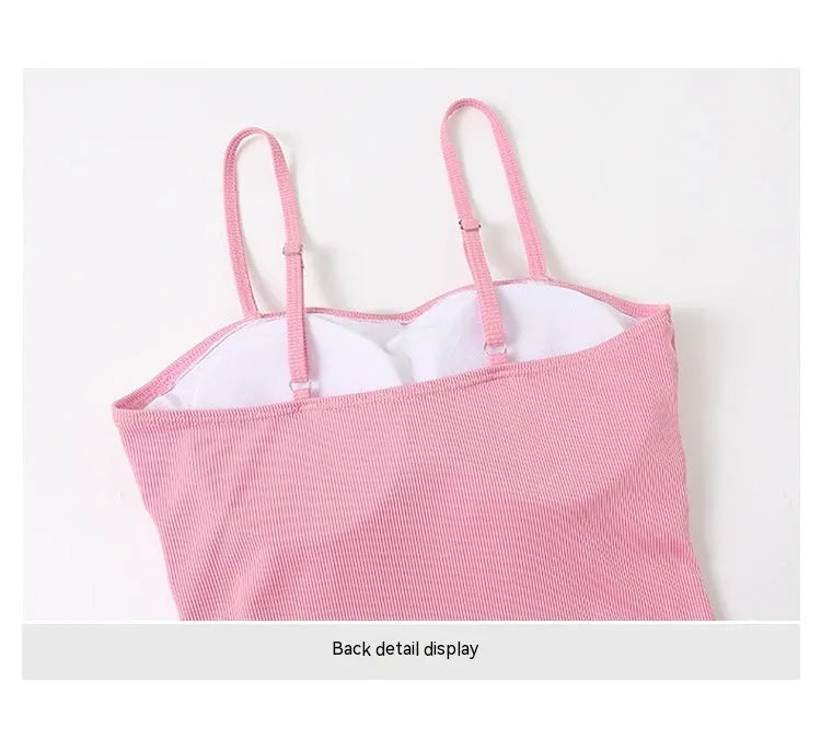 Women's long sleeve one-piece swimsuit in polyester fabric available in black or pink colours