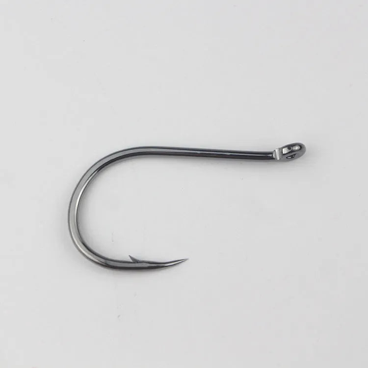 Bulk pack of barbed alloy carbon steel fishing hooks for rock and sea fishing in various sizes.