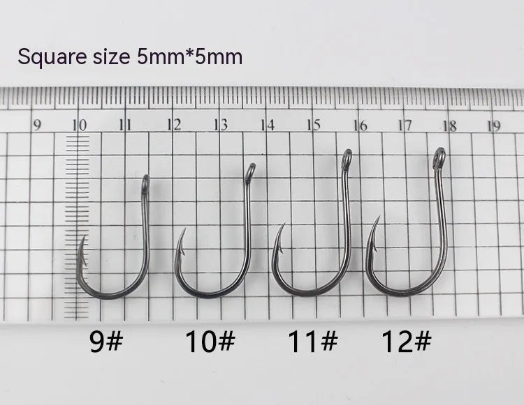 Bulk pack of barbed alloy carbon steel fishing hooks for rock and sea fishing in various sizes.