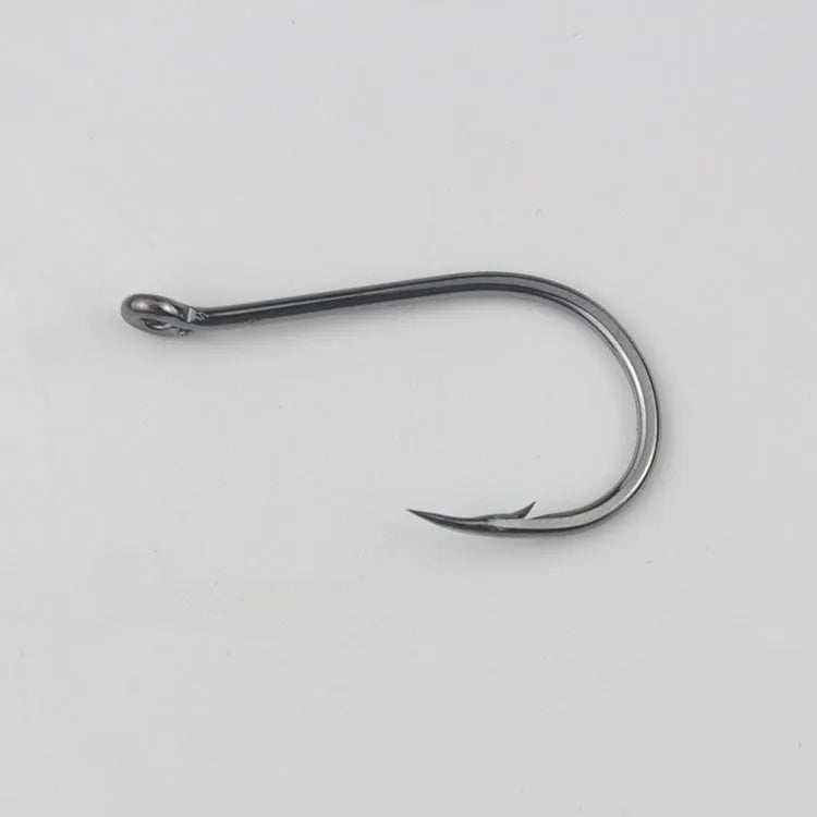 Bulk pack of barbed alloy carbon steel fishing hooks for rock and sea fishing in various sizes.