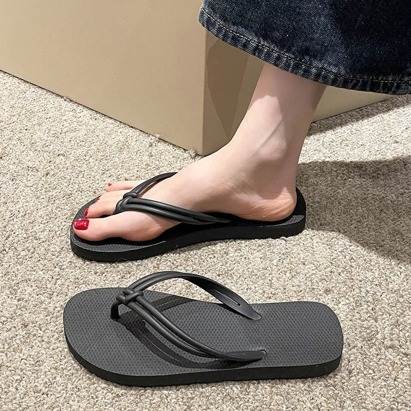 PVC casual flip flops for men with a toe-covering design and textured non-slip soles.