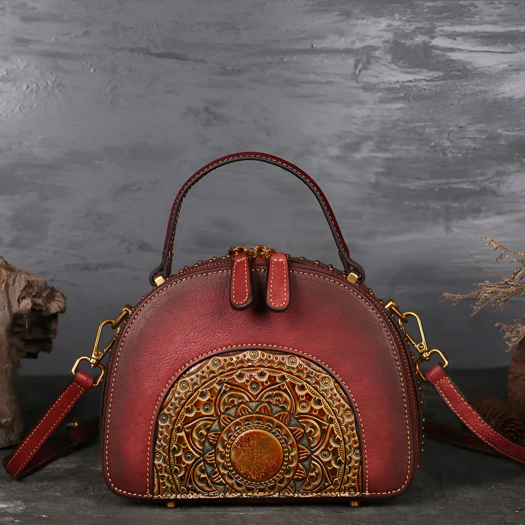 Vintage suede leather handbag in graphite ash showing interior ID, phone, and zipper pockets.