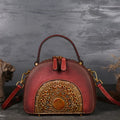 Vintage suede leather handbag in graphite ash showing interior ID, phone, and zipper pockets.