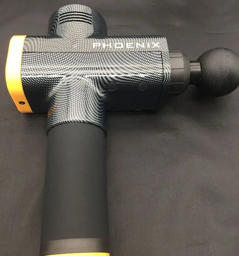 Black fascia massage gun with four removable heads on a grey background