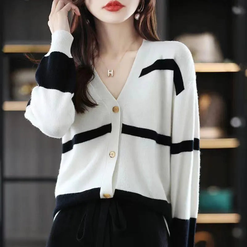 Women's striped V-neck button knitted cardigan with a 3D pattern in a slim fit.