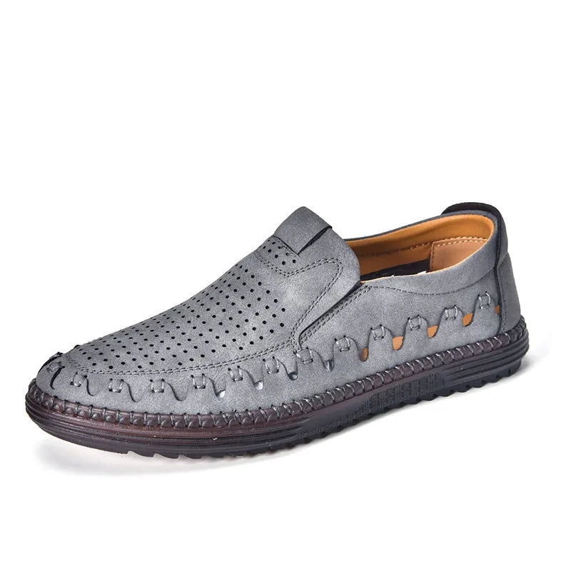 Men's brown slip-on casual shoes with round toe and flat PVC sole showing sewing line detailing