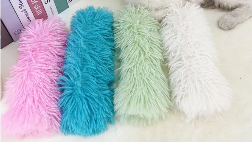 Blue plush cat toy pillow measuring 27 by 10 centimetres