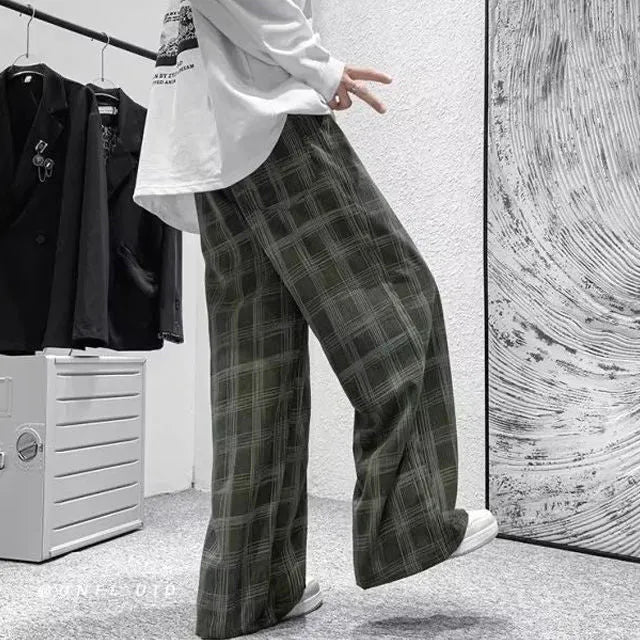 Japanese retro loose plaid pants in straight leg cut, available in black and green colour options