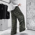 Japanese retro loose plaid pants in straight leg cut, available in black and green colour options