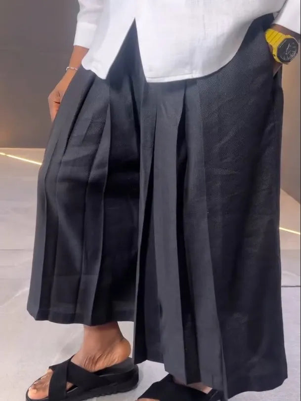 White asymmetric long sleeve shirt and black pleated trousers casual outfit set